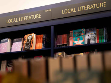 Books displayed on the shelves of the local literature section in Books Kinokuniya on July 4, 2024.